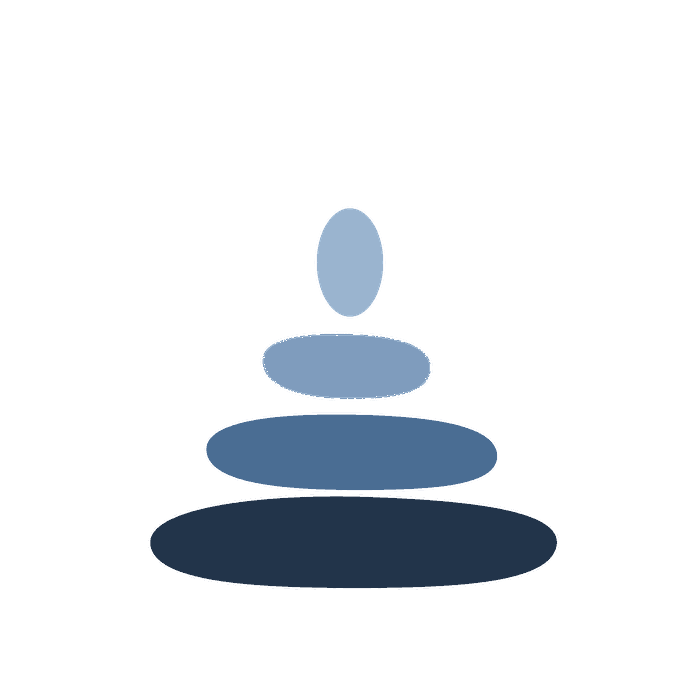 Cuatro piedras apiladas en equilibrio en tonos de azul